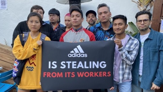 Photo: #PayYourWorkers calls on adidas to end wage theft in supply chain.